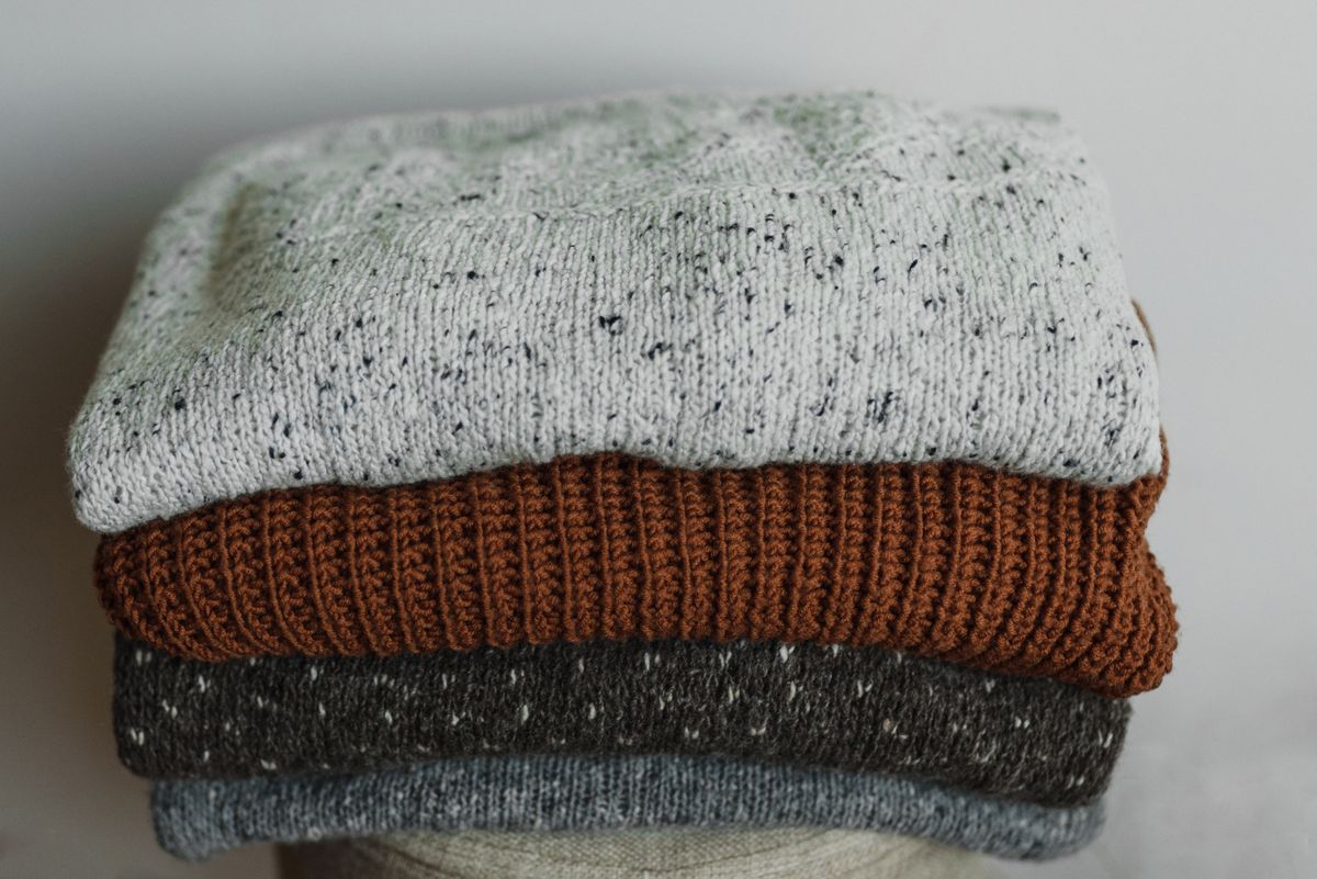 Folded knitwear in natural tones